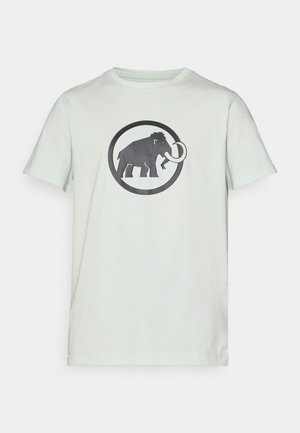 Light green cotton t-shirt featuring a black graphic of a mammoth within a circular design. Short sleeves and a round neckline.
