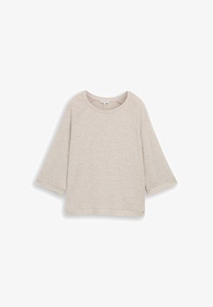Ljusbeige tröja i mjukt tyg med rund halsringning, trekvarts raglanärmar och ribbad nederkant och ärmslut för textur.