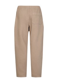 Beige bomuldsbukser med elastisk talje, tætsiddende ben og en enkelt baglomme. Glat tekstur og minimalistisk design.