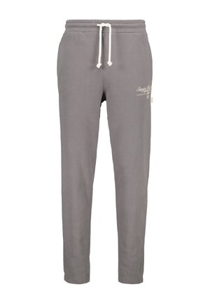 Grijze sweatpants met een elastische tailleband, verstelbaar trekkoord en zijzakken. Bevat een subtiele witte geborduurde logo aan de voorkant.
