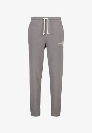 Grijze sweatpants met een elastische tailleband, verstelbaar trekkoord en zijzakken. Bevat een subtiele witte geborduurde logo aan de voorkant.