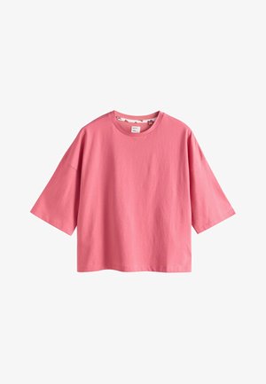 Kurzes rosa Baumwoll-T-Shirt mit rundem Ausschnitt und kurzen, weiten Ärmeln. Glatte Textur, lockere Passform und keine sichtbaren Muster oder Grafiken.