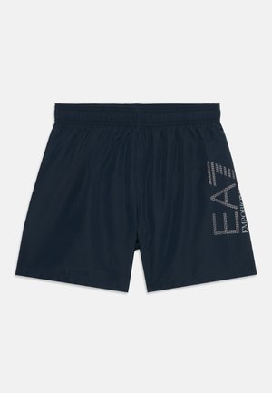 Bañadores para hombre en azul marino con cintura elástica y el logo plateado "EA7 Emporio Armani" en la pierna derecha.