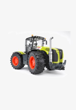 Claas Xerion tractor, green and black body, large black tires with orange rims, prominent exhaust pipe, cab with glass panels, and safety lights.
