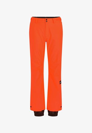 Orange waterproof pants with a relaxed fit, featuring a black waistband, snap closure, and brown accents at the hem, designed for outdoor activities.