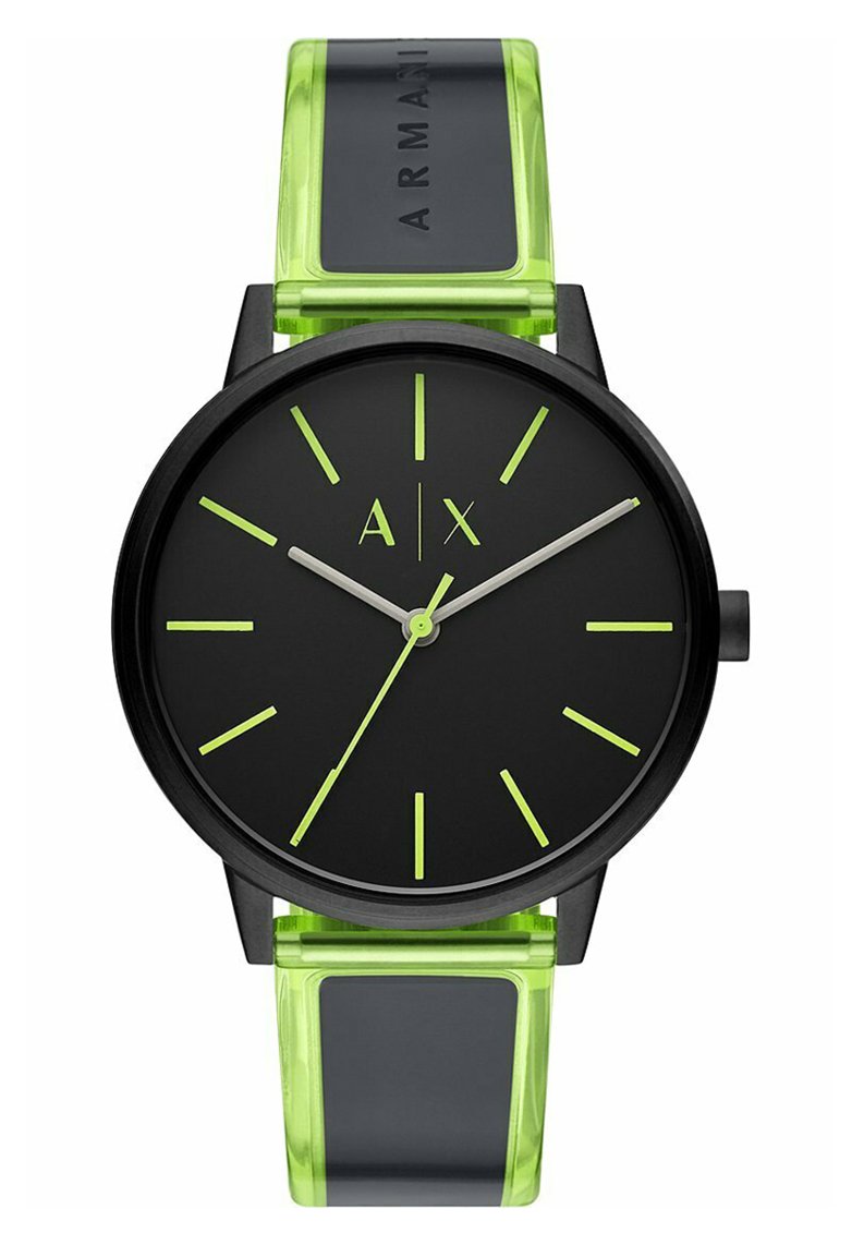 Orologio analogico nero con quadrante rotondo, indicatori delle ore e lancette verdi. Il cinturino è di un verde traslucido con un accento nero.
