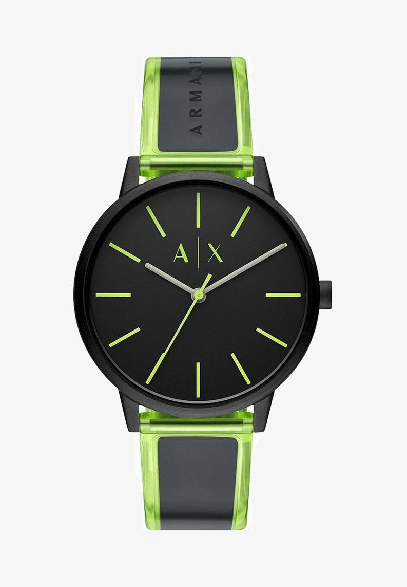 Montre analogique noire avec un visage rond, des marqueurs d'heure verts et des aiguilles. Le bracelet est vert translucide avec un accent noir.