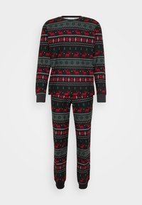 Black pajama set featuring a red and green reindeer pattern, with a long-sleeve top and pants, crafted from soft fabric.