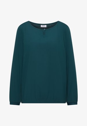 Blusa teal con maniche lunghe, scollatura rotonda e dettaglio con bottoni sulla parte anteriore. Realizzata in tessuto liscio con orlo arricciato.