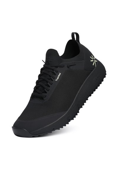 Black athletic shoe with a mesh upper, structured silhouette, textured outsole, and minimal design. Features laces and a subtle logo.