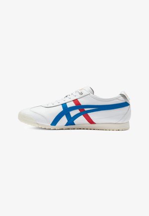 White athletic shoes with blue and red stripes, leather upper, rounded toe, flat rubber sole, and minimalistic design featuring logo accents.