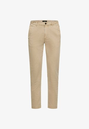 Beżowe chinosy z bawełny o dopasowanym kroju, z zapięciem na guzik, szlufkami na pasek i bocznymi kieszeniami; gładka faktura i nogawki o prostym kroju.
