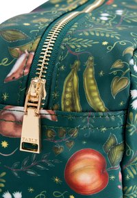 Green fabric bag featuring gold zipper, detailed with botanical illustrations, including fruits and animals, with a smooth texture.