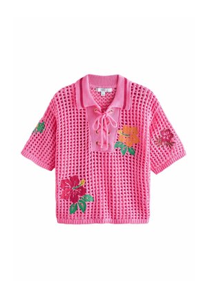 Ružové krátkorysové pletené polo s golierom na viazanie a vyšívanými tropickými kvetmi vpredu a na rukávoch.