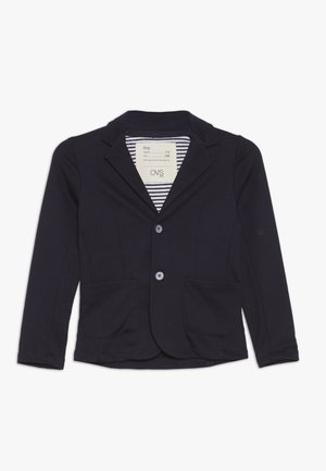 Granatowa marynarka uszyta z elastycznego materiału, z wyciętymi klapami, dwoma przednimi kieszeniami oraz dwoma guzikami do zapięcia. Wewnętrzna podszewka w paski.