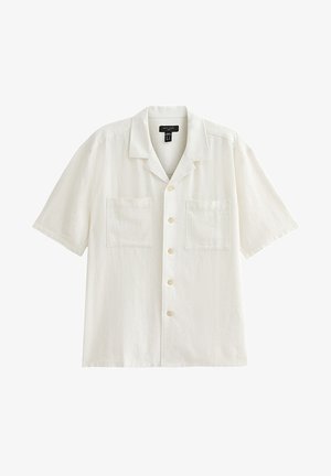 Biała lniana koszula z krótkim rękawem i spiczastym kołnierzykiem, z dwoma przednimi kieszeniami i zapięciem na guziki z przodu. Gładka faktura.