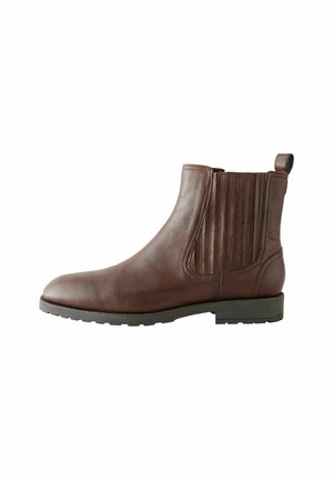 Bottines en cuir marron à panneaux latéraux élastiques, avec une texture lisse, un bout arrondi et une semelle en caoutchouc robuste. Présentent des accents de couture verticale.