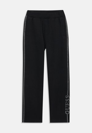 Sorte joggebukser med sidelommer, elastisk midjebånd, sølvdetaljer langs siden og logo-dekorasjon nær sømmen.