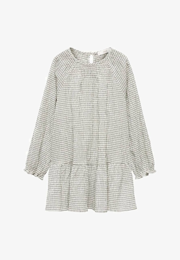 Vestido de manga larga a cuadros en blanco y negro con un escote fruncido, falda peplum y mangas con puños. Fabricado en tela ligera.