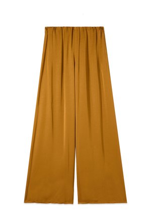 Bukser med vidde i sennepsgul farve, elastisk talje, glat stof og diskrete rynker i toppen.