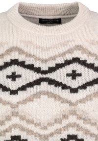 Crèmekleurige trui met een geometrisch patroon in zwart en taupe, gemaakt van zachte gebreide stof met een ronde kraag.