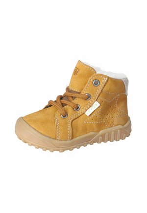 Braune Leder-Stiefelette mit runder Zehenpartie, schnürbarem Design, weißem Fellfutter, durchbrochenem Sternmotiv und einer strukturierten Gummisohle.