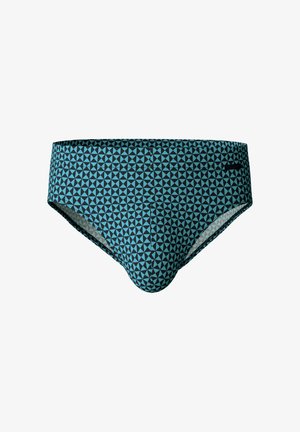 Slips de bain pour homme en tissu lisse, arborant un motif géométrique en triangles bleus et noirs, avec une taille basse et un design de ceinture simple.