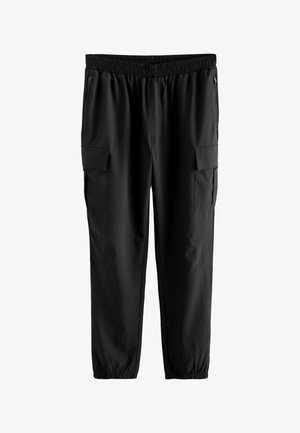 Melna cargo bikses ar elastīgu jostu, sānu rāvējslēdzēja kabatām un divām lielām cargo kabatām ar atloku aizdari. Gluda, viegla auduma.