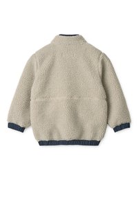 Svetlo béžová fleecová bunda s textúrovaným vonkajším povrchom, elastickými modrými manžetami, stojacím golierom a jednoduchým dizajnom na chrbte bez ozdôb.