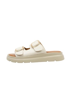 Sandale blanche à enfiler avec deux brides réglables dotées de boucles dorées et une semelle beige épaisse.