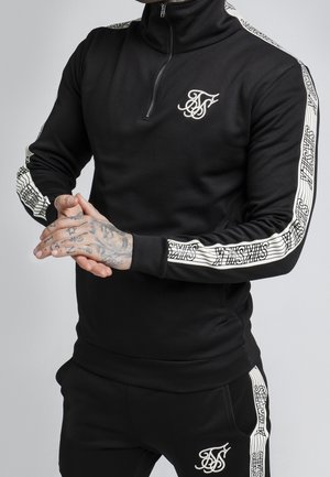 Långärmad tröja - black