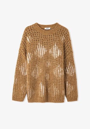 Gebreide trui in warm goud, met een open weefstructuur en paillettenaccenten. Ronde halslijn en een losse pasvorm met verlaagde schouders voor extra comfort.