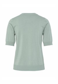 Svijetlo zelena, pletena majica s kratkim rukavima, okruglim izrezom i rebrastim rubom. Tekstura izgleda mekano i blago rastezljivo.