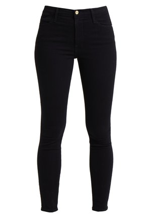 Mustat korkean vyötärön skinny-farkut, jotka on valmistettu denimestä, jossa on edessä nappisuljenta, viisi taskua ja minimaalista ommeltua.