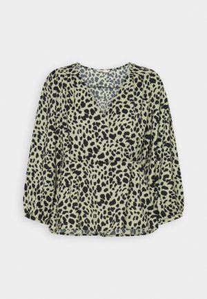 Leopard print blouse in light green with black spots, featuring a V-neck, long puffed sleeves, and a gathered waist detail.
