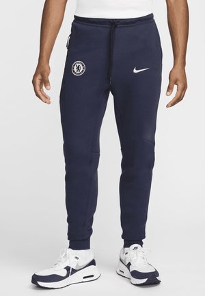 Nike Performance TECH - Träningsbyxor - obsidian guava ice