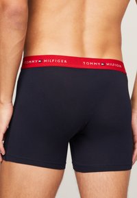 Tommy Hilfiger 3 PACK - Trunks - desert sky/white/primary red