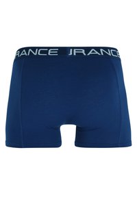 Marineblauwe boxershorts van een gladde stof, met een brede elastische tailleband waarop in contrasterende lichtblauwe letters "FRANCE" is gedrukt.