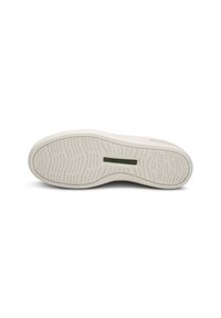 Suola di sneaker bianca con un pattern testurizzato e rigato. Presenta un'area accentata verde "Natural Soft". Materiale in gomma durevole e design minimalista.
