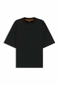 Black crew neck t-shirt made of smooth fabric, features short sleeves and subtle orange inner neckline detail. Boxy, relaxed shape.