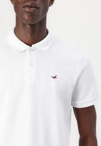Hollister Co. Stretch Polo 3-Pack - Poloshirt - white/navy/black