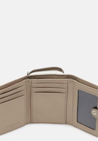 Beige leather wallet with multiple card slots, a clear ID pocket, and a zippered coin compartment. Smooth texture and subtle stitching details.