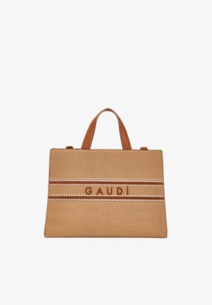 Borsa rettangolare in tela color sabbia con manici in pelle marrone, due accenti a strisce orizzontali e "GAUDI" ricamato in marrone sul davanti.
