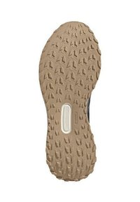 Suela de zapato de goma con un patrón texturizado para agarre, que presenta un color marrón claro, forma redondeada y un detalle de logo blanco incrustado.