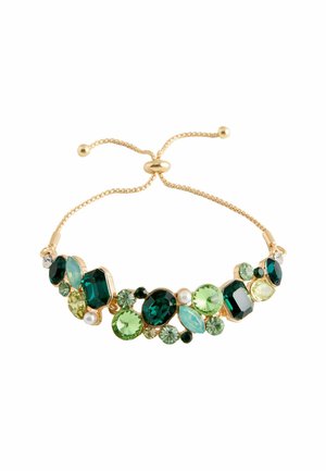 Gold bracelet with multi-colored gemstones in shades of green, decorated with a mix of round and oval shapes, featuring a sliding clasp.