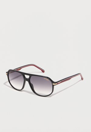 Black and red aviator-style sunglasses with gradient gray lenses and a gold Carrera logo on the top right lens.