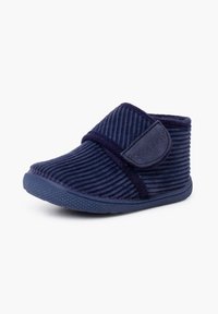 Pantofole stivali in velluto a coste di colore blu navy con una morbida texture, fascia in Velcro avvolgente e suola in gomma testurizzata per una presa sicura.