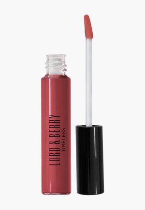 Geöffnete Tube des Lord & Berry Timeless flüssigen Lippenstifts in Mauve-Farbton mit Applikatorstab neben schwarzem Deckel auf weißem Hintergrund.
