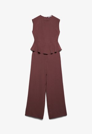 Tuta marrone senza maniche con dettaglio a vita con balza e pantaloni a gamba larga, con chiusura posteriore con cerniera.