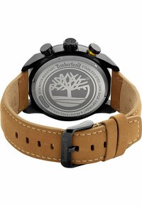 Schwarze Chronographuhr mit rundem Gehäuse aus Edelstahl, brown Wildlederarmband und weißen Nähten. Graviertes Timberland-Logo auf der Rückseite.
